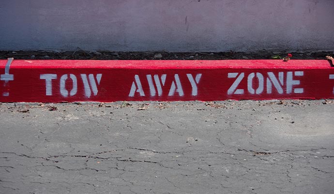 Commercial tow away zone safety curb painting parking enforcement