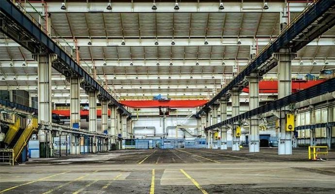 Industrial warehouse floor marked for new layouts