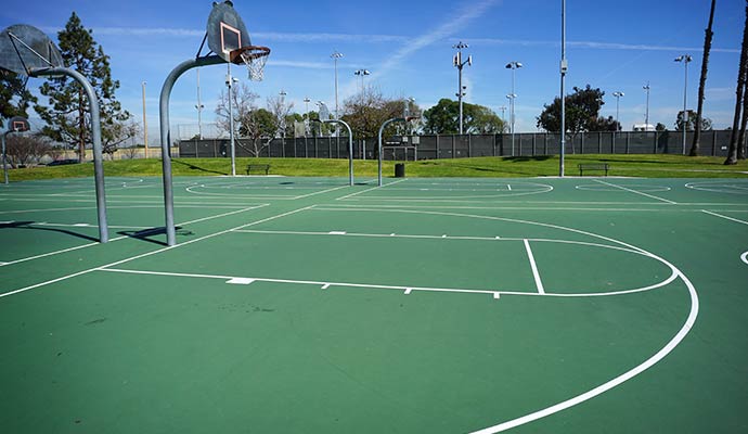 Multiple outdoor basketball courts on one property