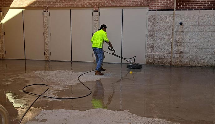 Commercial concrete garage floor cleaning