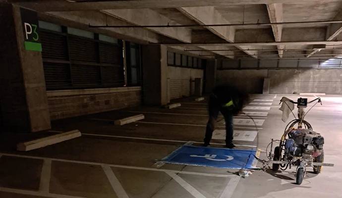 Cleaning a new parking lot