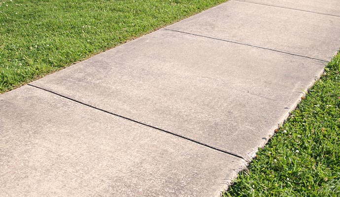 Clean sidewalk after professional power washing