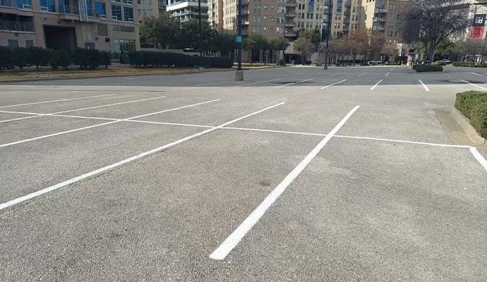Empty parking lot with fresh white lines.