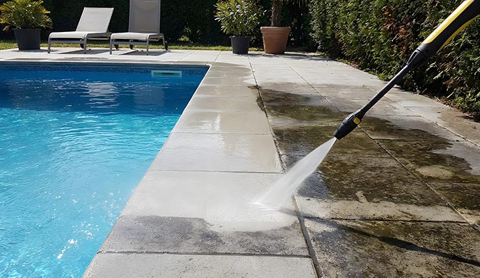 Pool deck cleaning using power washing method