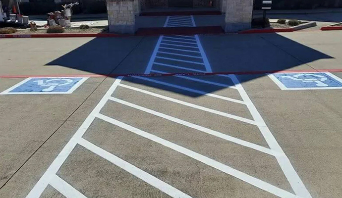 Newly marked fire lines and ADA compliance in a business crosswalk