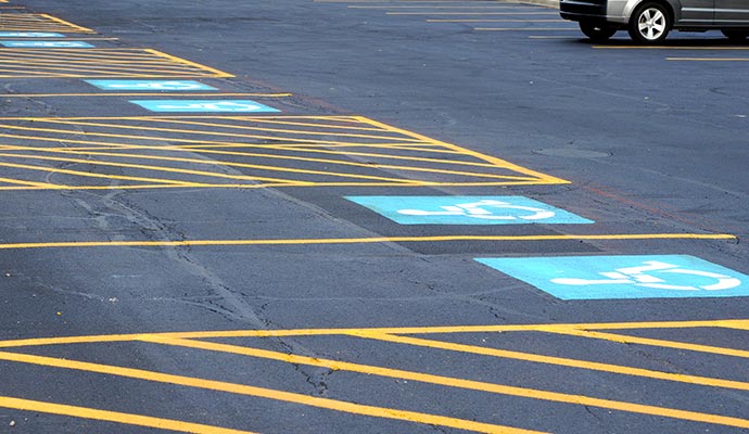 Thermoplastic strips on parking lot