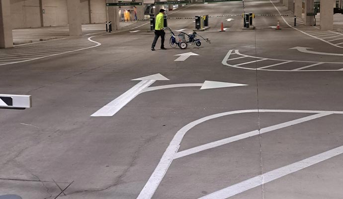 Thermoplastic strips on parking lot